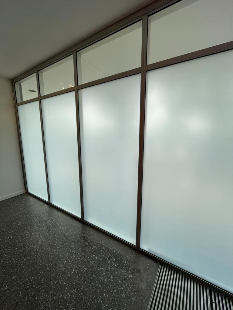 Frosted window panes allowing diffuse daylight into an interior
